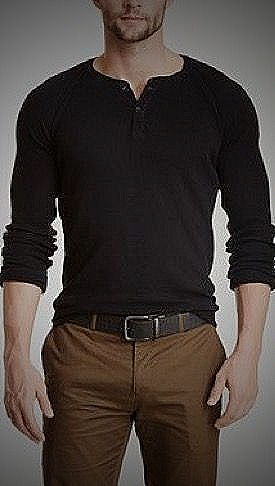 A man in a brown shirt and brown pants