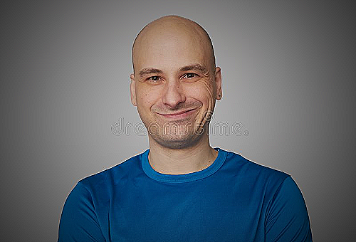 Bald man smiling