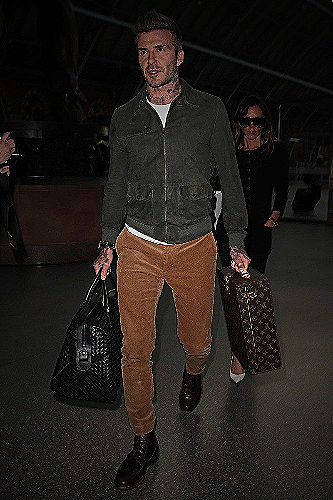 David Beckham in Black Dress Shirt and Grey Trousers