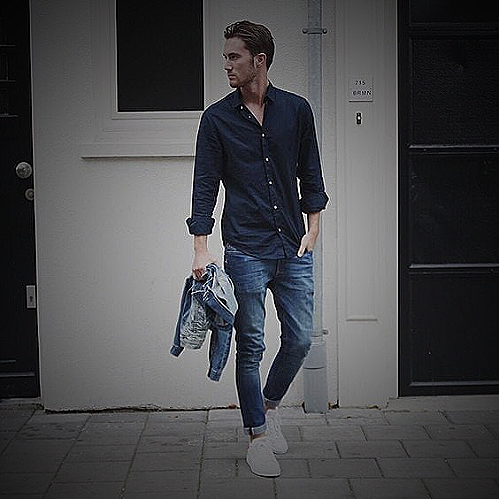 Navy blue shirt black pants with white sneakers and blue denim jeans