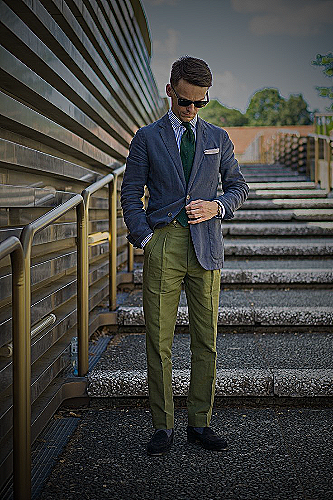 Olive drab pants with navy blue shirt