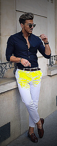 White pants with navy blue shirt