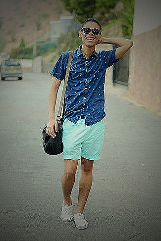 navy blue shirt with green shorts