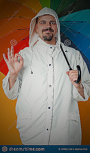Man wearing a raincoat and holding an umbrella at a visitation - what to wear to a visitation men