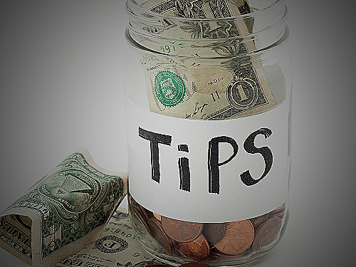 Tip Jar with Money - how much to tip for mens haircut