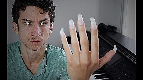 man clipping nails - how long should men's fingernails be
