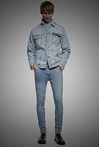 man wearing light wash jeans and a floral shirt - what to wear with light wash jeans men
